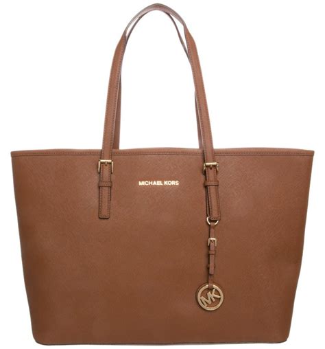 how to tell a genuine michael kors handbag|genuine michael kors bags.